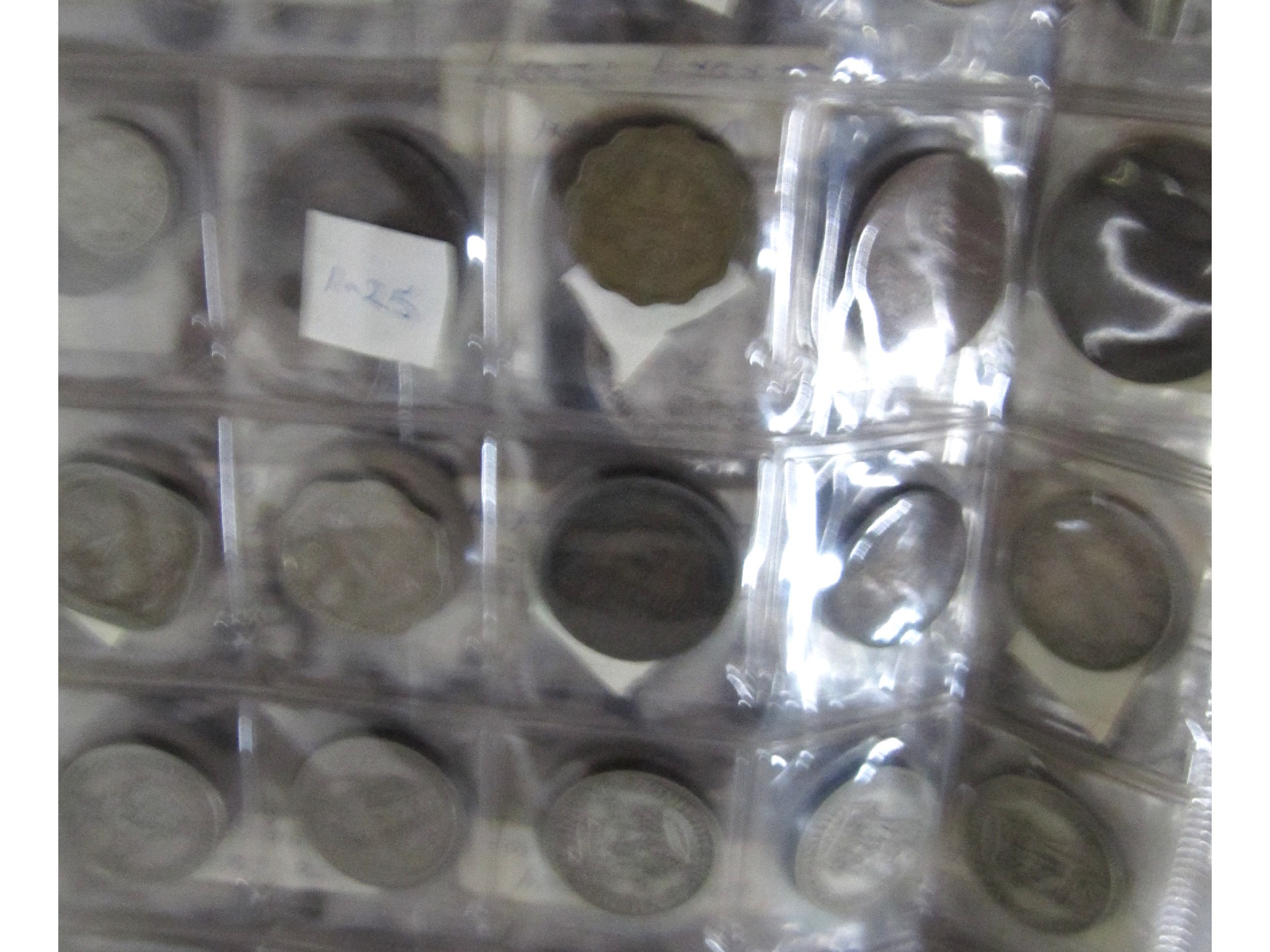 Appraisal: An album of mixed British and foreign coins to include