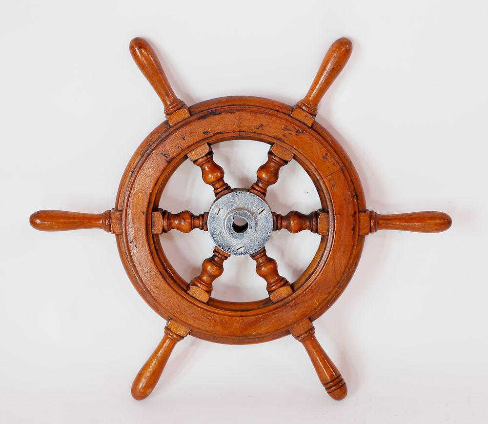 Appraisal: Small Mahogany Yacht Wheel with Chrome Hub Exclusive on Bidsquare