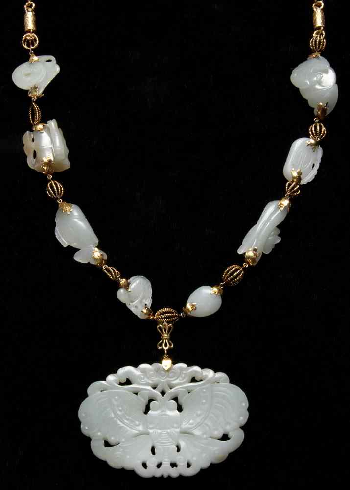 Appraisal: CHINESE GOLD JADE NECKLACE - th c Carved Jade Necklace