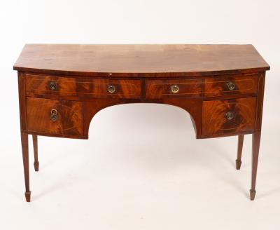 Appraisal: A mahogany bowfront sideboard on square tapering legs with spade