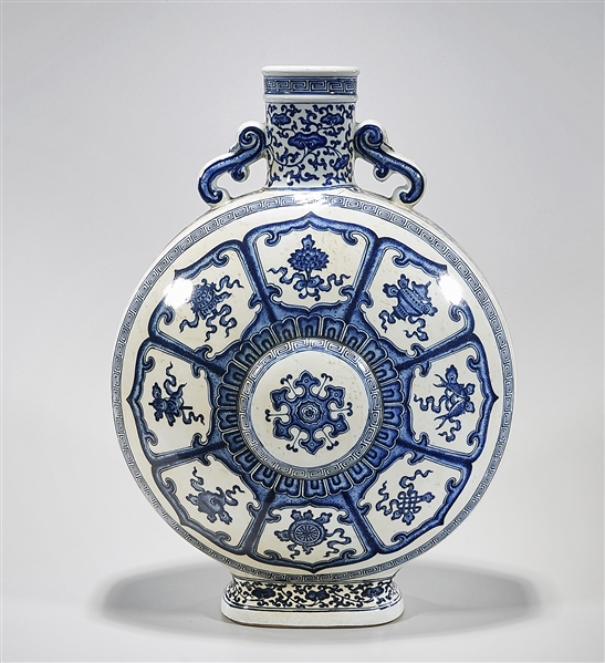 Appraisal: Chinese blue and white porcelain moon flask with foliate designs