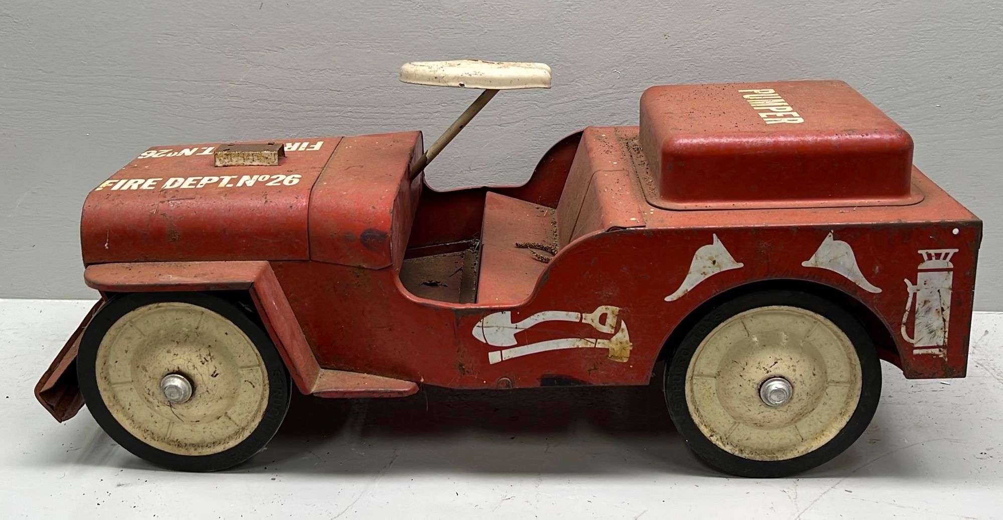 Appraisal: Structo pressed steel ride-on fire toymid th century