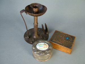 Appraisal: An Arts Crafts style metal candlestick by Goberg early th