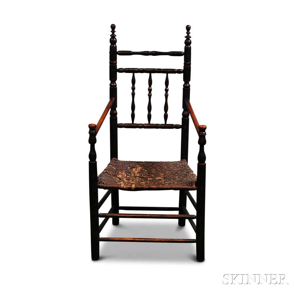 Appraisal: Turned and Black-painted Armchair America th century with vase and