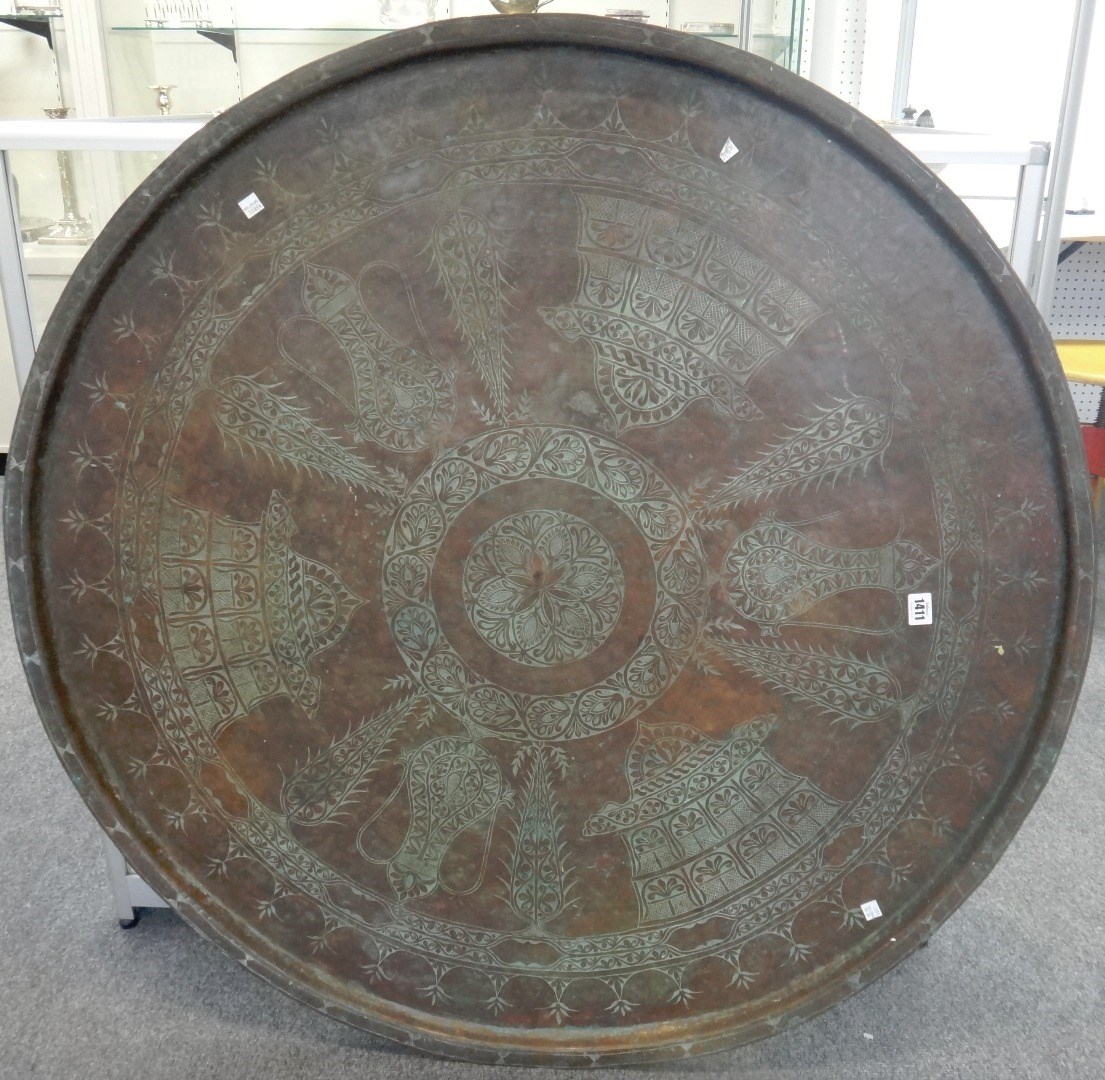 Appraisal: A large engraved copper-alloy circular tray Ottoman Balkans possibly Hungary