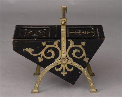 Appraisal: AESTHETIC MOVEMENT BRASS-MOUNTED EBONIZED AND GILT-INCISED COAL SCUTTLE ATTRIBUTED TO