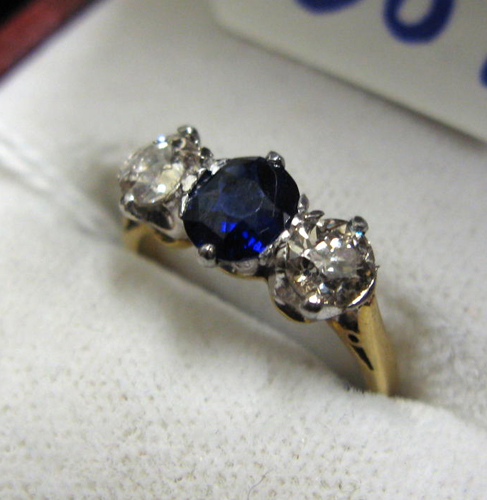 Appraisal: SAPPHIRE DIAMOND PLATINUM AND EIGHTEEN KARAT GOLD set with a