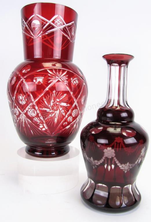 Appraisal: Two Bohemian Ruby Cut-To-Clear Glass Vases one bottle form with