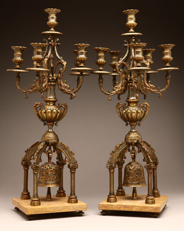 Appraisal: A pair of Napoleon III mixed metal-patinated bronze six-light candelabra