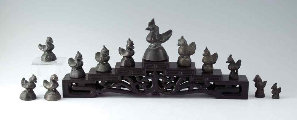 Appraisal: GROUP OF BRONZE FIGURAL OPIUM WEIGHTS Figural birds ranging in