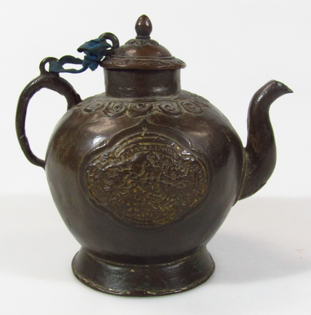 Appraisal: A Japanese bronze teapot of small proportion with domed lid