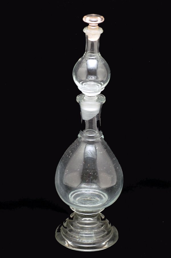 Appraisal: Cologne and perfume of blown and molded clear glass bottom