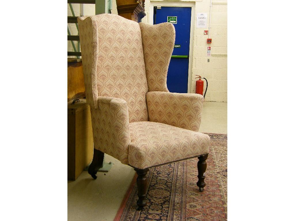 Appraisal: th century mahogany framed wing armchair with pink and white