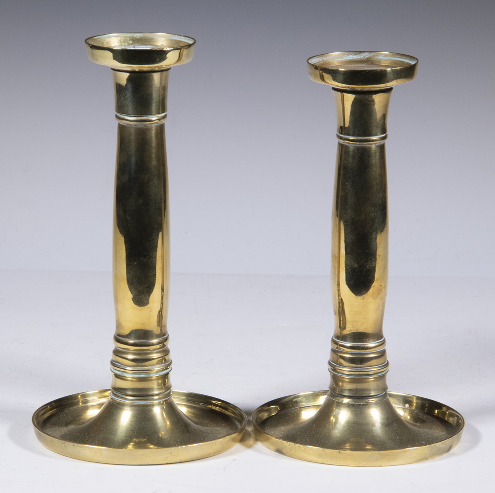 Appraisal: PAIR OF TH C ENGLISH BRASS CANDLESTICKS WITH ROUND TRAY