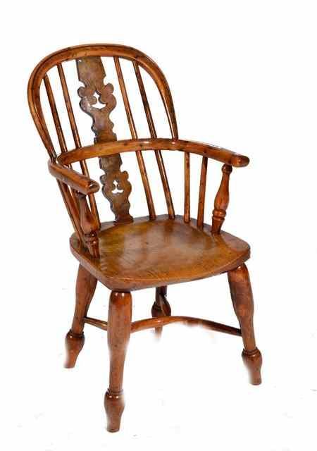 Appraisal: A GEORGIAN CHILD'S YEW WOOD AND ELM WINDSOR ARMCHAIR with