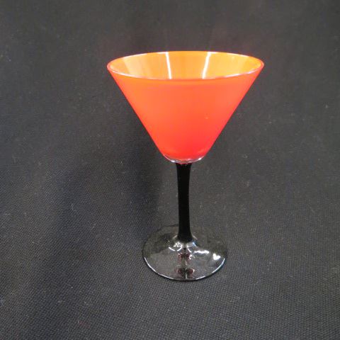 Appraisal: Art Glass Wines fiery orange with black bases attributed to