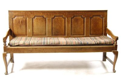 Appraisal: A George III oak settle the back with five fielded