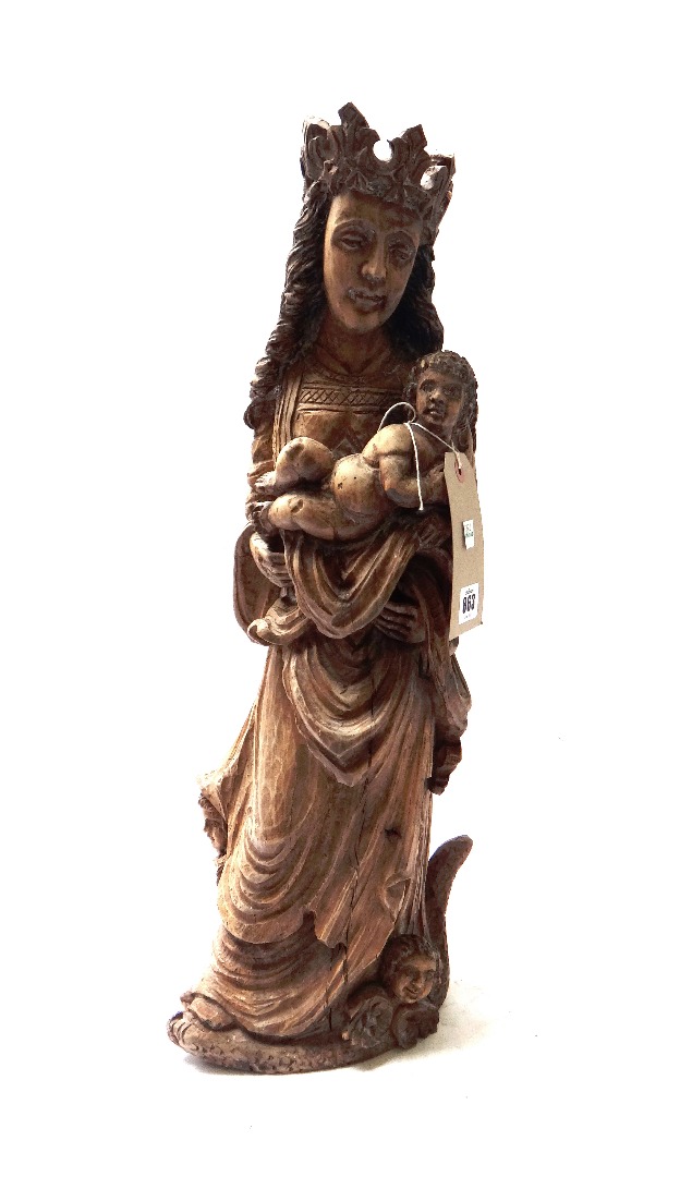 Appraisal: An th century style pine carving depicting Mary and the