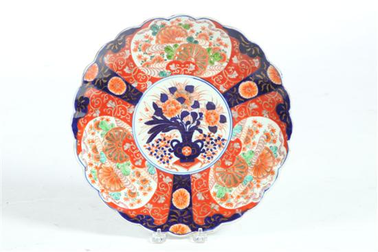 Appraisal: TWO IMARI CHARGERS Japan th century Scalloped edges with floral