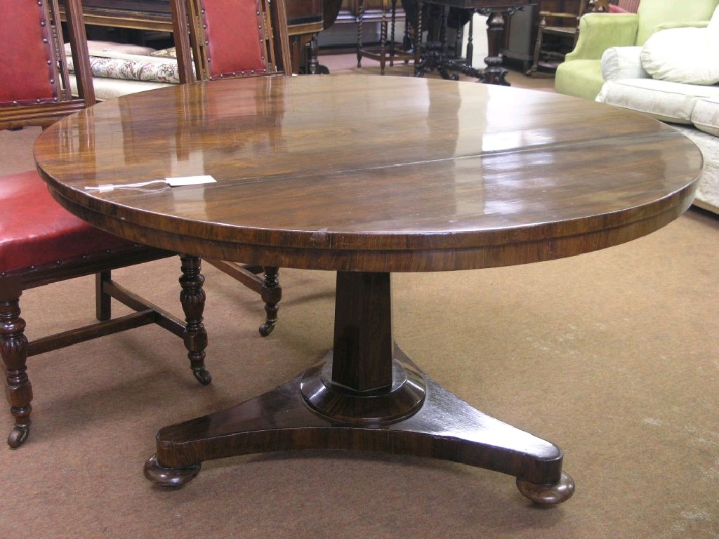 Appraisal: An early Victorian rosewood veneered tilt-top breakfast table circular top