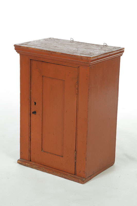 Appraisal: DIMINUTIVE HANGING CUPBOARD American th century pine and chestnut Paneled