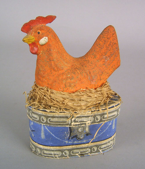 Appraisal: Composition hen on nest wallpaper box th c h