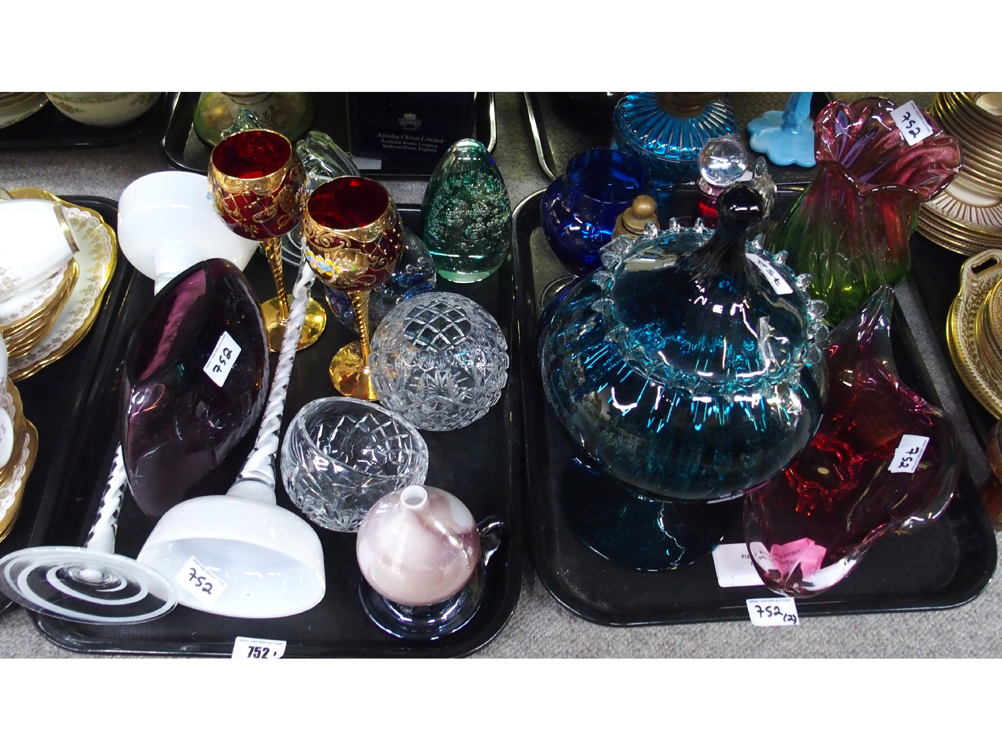 Appraisal: Two trays comprising coloured glass vases footed candy bowl pair