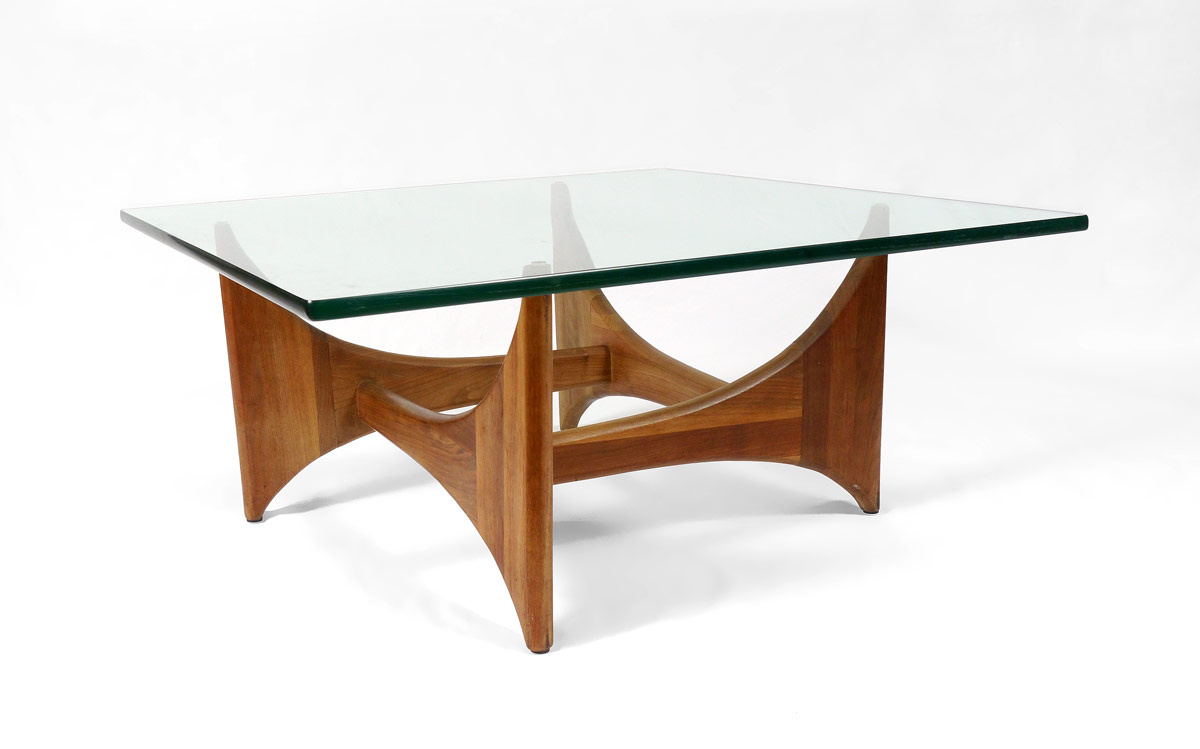 Appraisal: MID CENTURY COFFEE TABLE Amorphic sided wood base in the