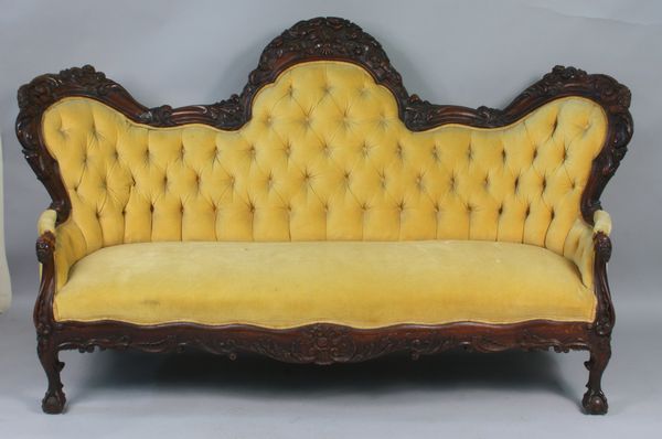 Appraisal: th Century Irish hand-carved sofa having unusual carved head design