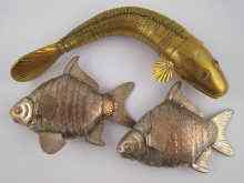 Appraisal: A mixed lot comprising three articulated fish ornaments largest approx