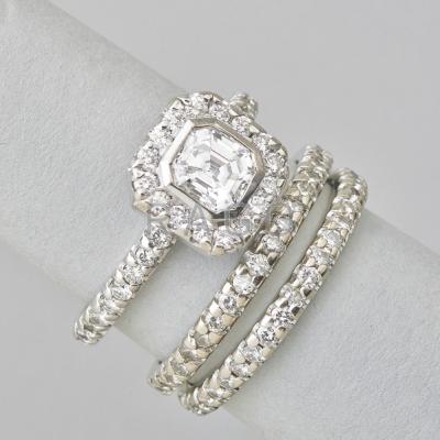 Appraisal: ASSCHER CUT DIAMOND WEDDING RINGS SET Asscher cut diamond approx