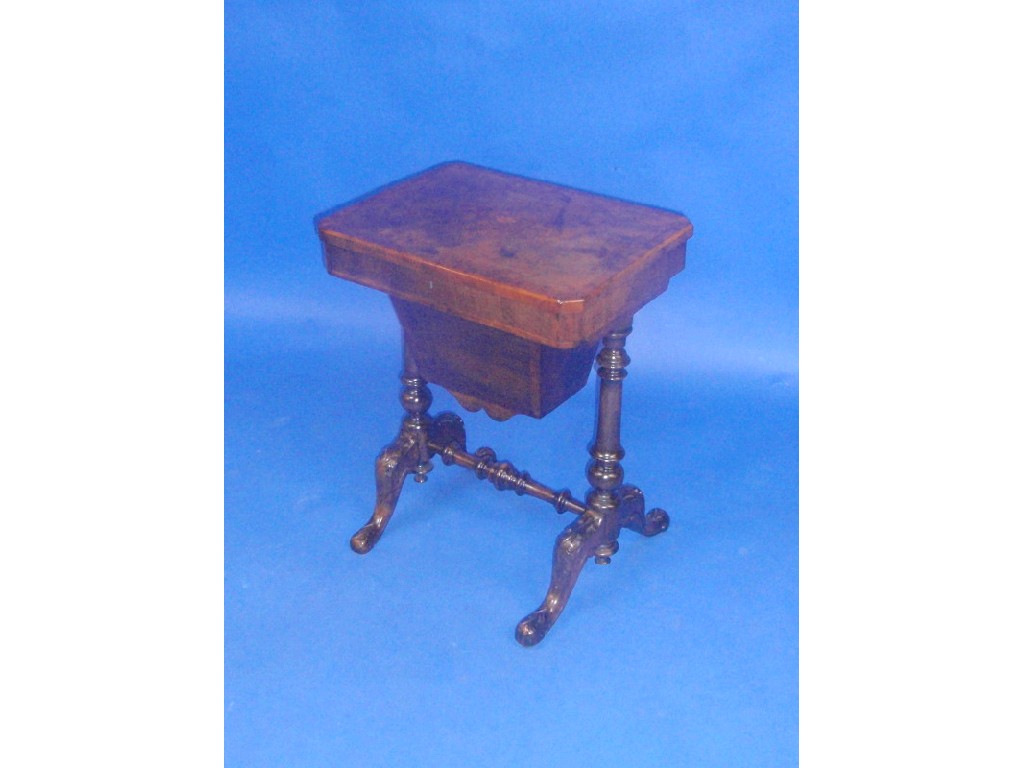 Appraisal: A Victorian burr walnut work table with cross banded and