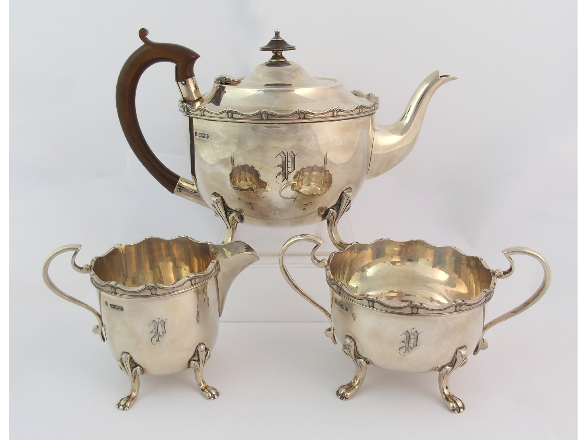 Appraisal: A three piece silver tea serviceby Cooper Brothers Sons Sheffield