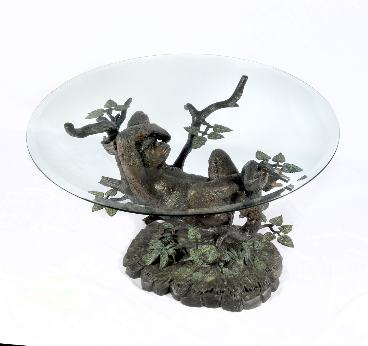 Appraisal: BRONZE MONKEY IN TREE TABLE BASE GLASS TOP Cast bronze