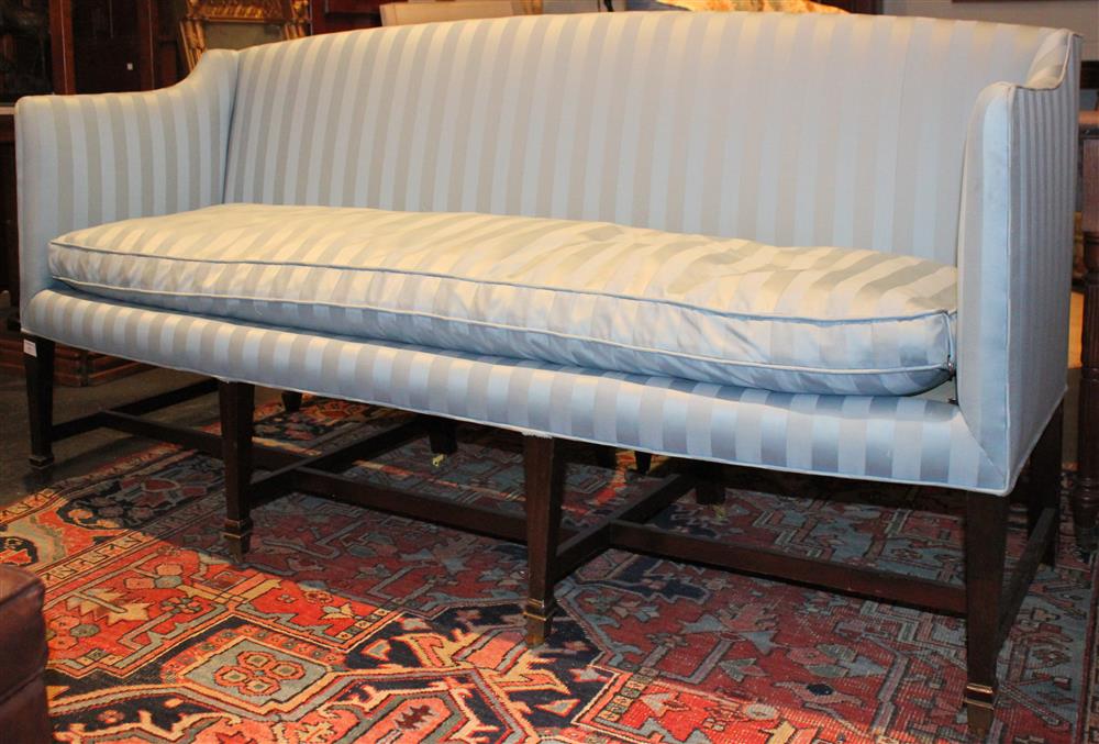 Appraisal: CLASSICAL MAHOGANY SETTEE having a slightly arched crest rail over