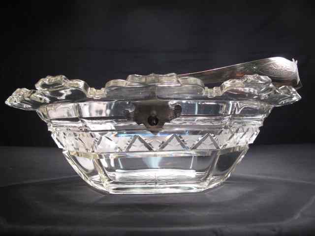 Appraisal: Unsigned cut crystal basket mounted on silver plated metal handle