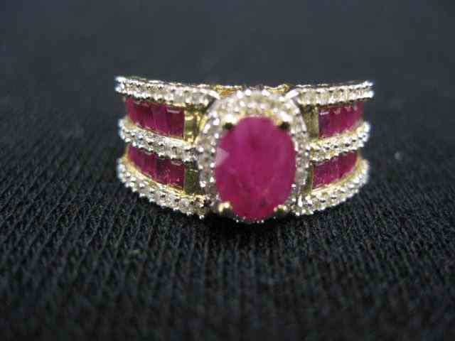 Appraisal: Ruby Diamond Ring oval ruby surroundedby diamonds with baguette rubies