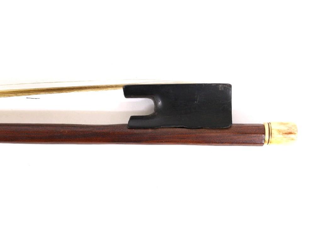 Appraisal: French violin bow by F X Bazin unstamped the stick