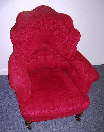 Appraisal: A Victorian mahogany framed shell back armchair with upholstered back