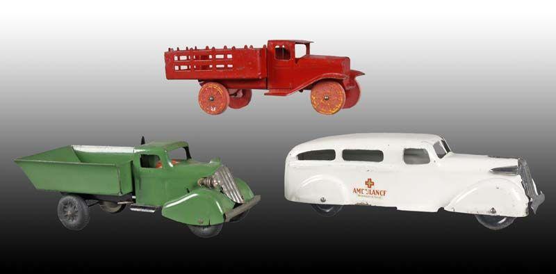 Appraisal: Lot of Wyandotte Pressed Steel Truck Toys Description All ''