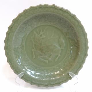 Appraisal: Longquan Celadon Plate Longquan Celadon Plate With scalloped edge and