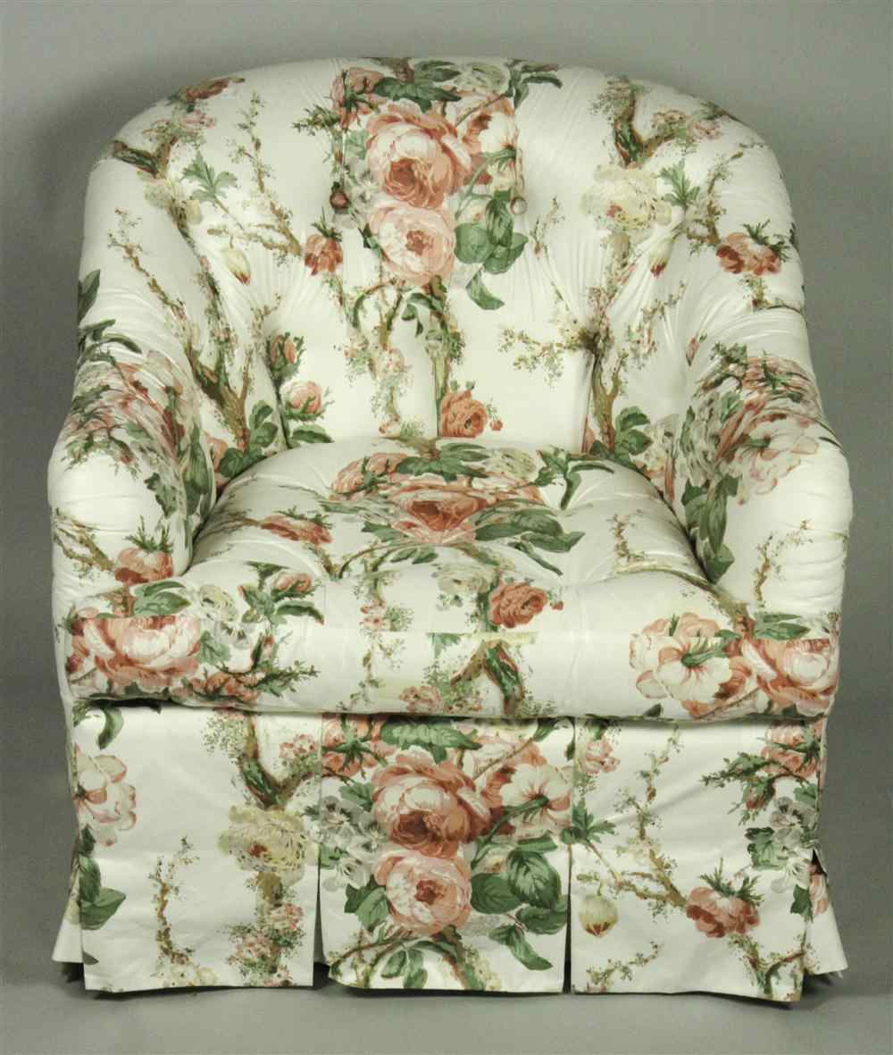 Appraisal: CLUB CHAIR IN A FLORAL CHINTZ UPHOLSTERY having a rolled