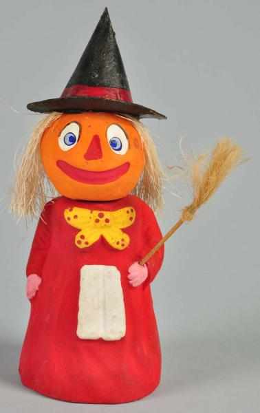 Appraisal: Halloween Pumpkin Head Witch Candy Container Description Straw hair and