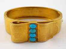 Appraisal: A yellow metal tests carat gold bangle designed as a