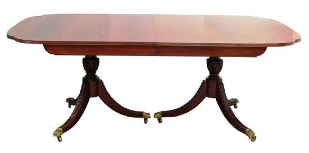 Appraisal: Karges dining table with four leaves and pads oblong with