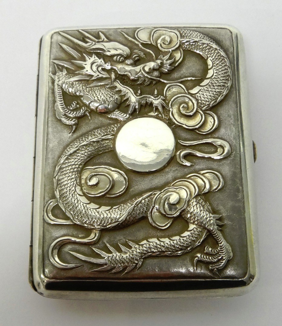 Appraisal: A Chinese rectangular cigarette case decorated with dragons detailed WF