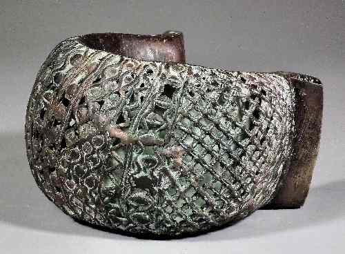 Appraisal: A copper alloy Currency Bracelet Nigeria - Large heavy bracelet