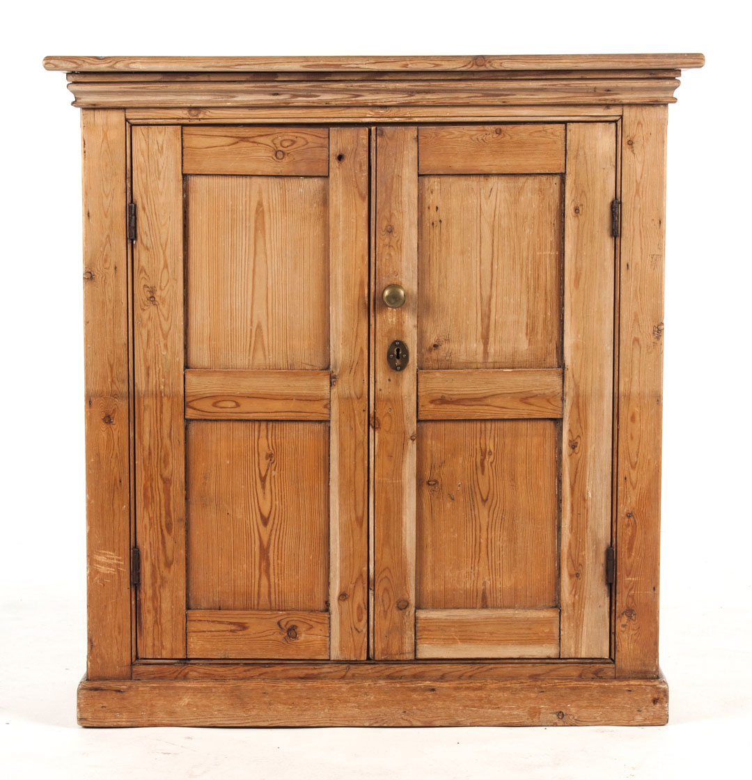 Appraisal: English scrubbed dealwood two-door cabinet th th century two interior