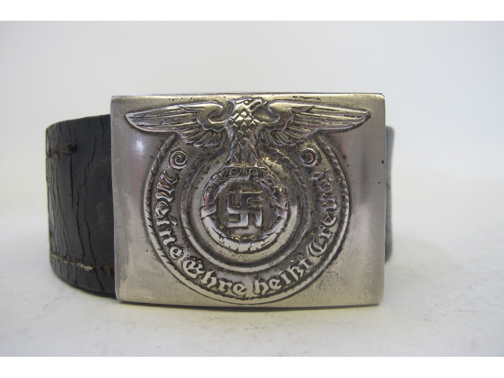 Appraisal: A German Military belt with buckle and Death's Head Badge