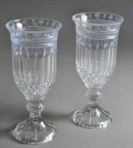 Appraisal: PAIR OF SHANNON CRYSTAL URNSIrish crystal urns with geometric shapes